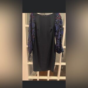 Badgley Mischka navy dress beautiful sleeves and dress overall! Size 4